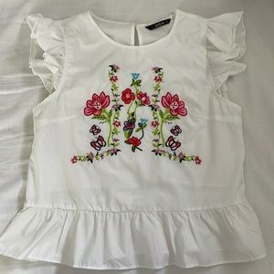 Embroidered white ruffle sleeve blouse